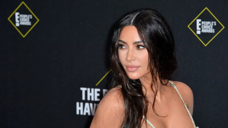 Kim Kardashian’s Lingerie Peeks Out in Daring & Hot Holiday Party Outfit
