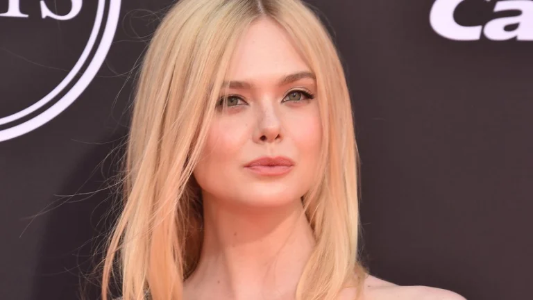 Elle Fanning Debuts a Sleek Sleeveless Power Suit in Latest L’Oreal Paris Video
