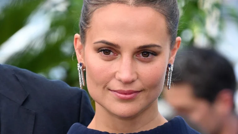 Alicia Vikander Ignites Paris Fashion Week in Plunging Top, Microshorts, and Towering Boots