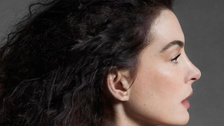 Anne Hathaway, 43, Flaunts Cleavage in Eye-Catching Yellow Plunge Dress