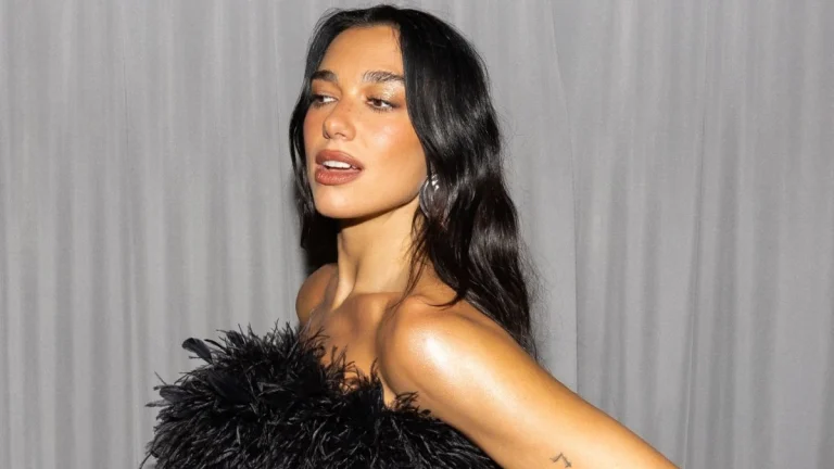 Dua Lipa Channels Wonder Woman in Gold Skimpy Suit in a Throwback