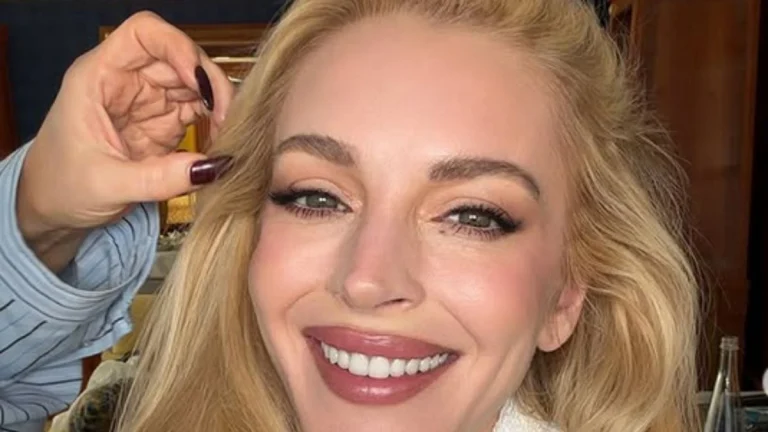 Lindsay Lohan Shows Off Flawless Curves for Vogue Arabia in Dark Red Dress