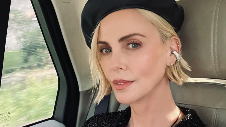 Charlize Theron, 50, Steals the Spotlight in Micro Miniskirt and Stockings at Dior Fashion Show