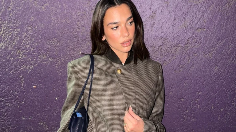 ‘Barbie’ Star Dua Lipa Stuns in Monochrome Purple Look During Paris Fashion Week Trip