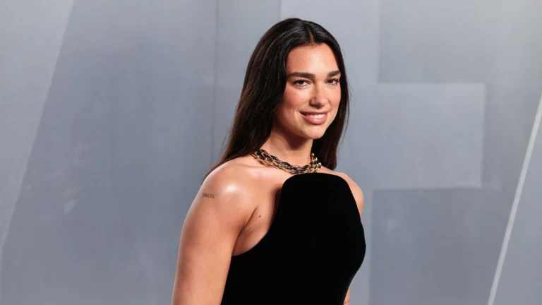 Dua Lipa Slays in a Metallic Dress That Hugs Every Curve and Shimmers With Every Move