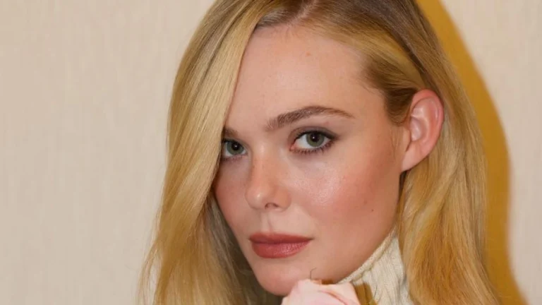 Elle Fanning Teases in Black with a Sky-High Slit at Pre-Oscars Soirée