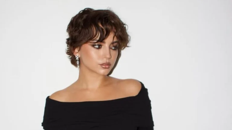 Isabela Merced Turns Heads in Figure-Hugging Black Dress With Bold Thigh-High Slit