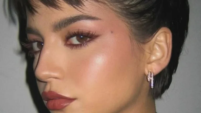 Isabela Merced Flaunts Braless Curves in a Skin-Tight Mini Dress