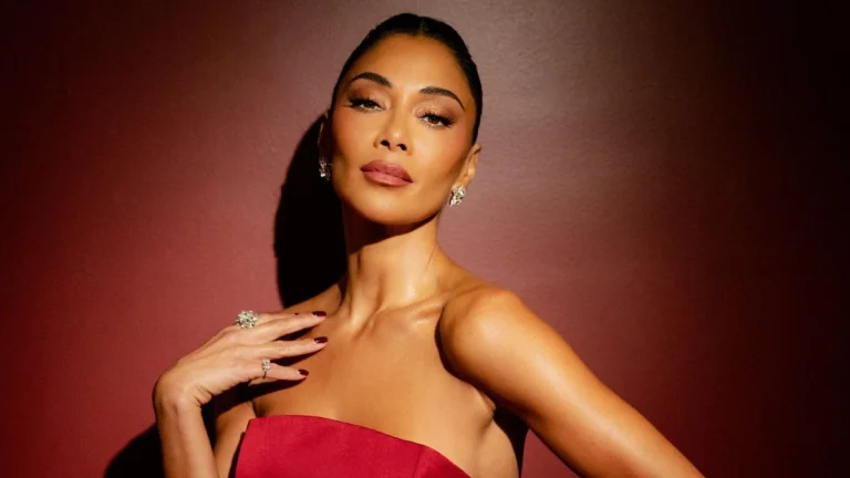 Nicole Scherzinger’s (47) Cleavage Barely Contained in Sheer Black Top and Leather Pants in Throwback Snap