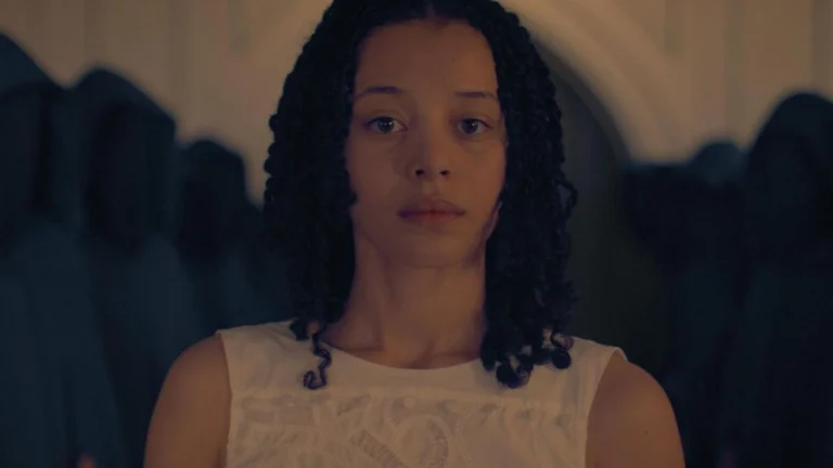 Chase Infiniti Commands ‘The Testaments’ Purple Carpet in a Curve-Hugging Corset Dress