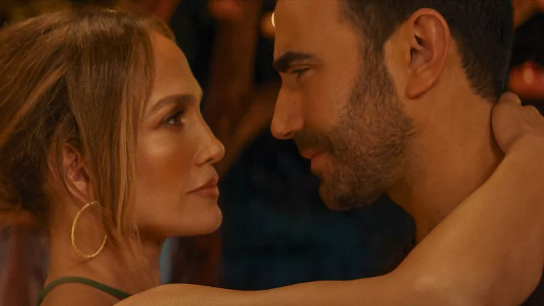 Jennifer Lopez and Brett Goldstein’s Steamy ‘Office Romance’ Trailer Teases Love That Could Cost Them Everything