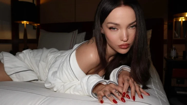 ’56 Days’ Star Dove Cameron’s Newlywed Glow Takes Center Stage in Striking Close-up Showing off Voluminous Hair and Sharp Winged Liner