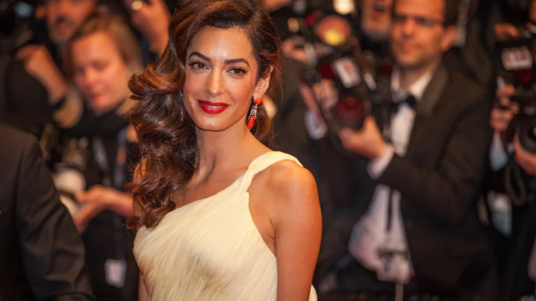 Amal Clooney (48) Goes for Gold in a Dazzling Custom Gucci Gown at the Albies